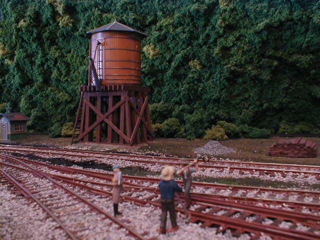 railroad spikes pounded by water tower